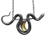 Sterling Silver Snake Necklace with Golden Crescent Moon close up view