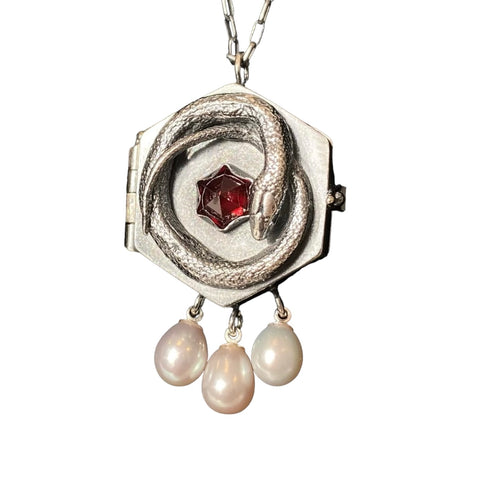 Hexagonal locket with reversed garnet and triple pearl drops