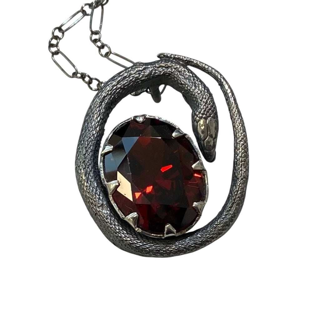 Sterling Serpent and Ruby Egg pendant 8 square prongs