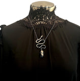 Sterling Silver Black Onyx Belladonna Pendant on mannequin