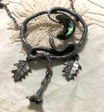 Double Serpent Snake Necklace with labradorite Crescent Moon image on lace background
