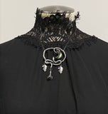 Double Serpent Snake Necklace with labradorite Crescent Moon datura flower shown on mannequin