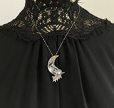 Datura Waning Crescent Moon Necklace in Sterling Silver shown on Mannequin