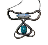 Double Serpents with Moonstone and Scarab