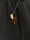 Large Crescent Moon and carnelian droplet fringe pendant