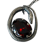 Sterling Serpent and Ruby Egg pendant 8 prongs