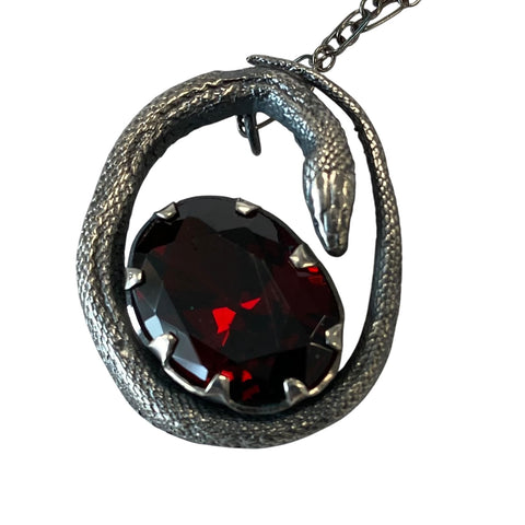 Sterling Serpent and Ruby Egg pendant 8 prongs