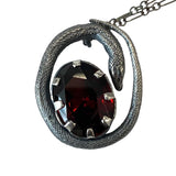 Sterling Serpent and Ruby Egg pendant 8 square prongs