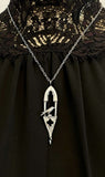 Long Gothic Crow Pendant with Twisted Flame Finial