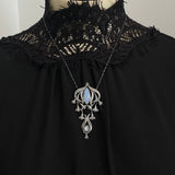 Long Art Nouveau Panel Pendant with Moonstones